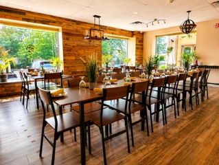 Lilly's Hideaway set up with a long table for a private event